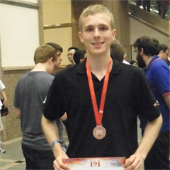 Gilles Englebert décroche une médaille de bronze aux olympiades internationales en informatique (IOI) à Taipei